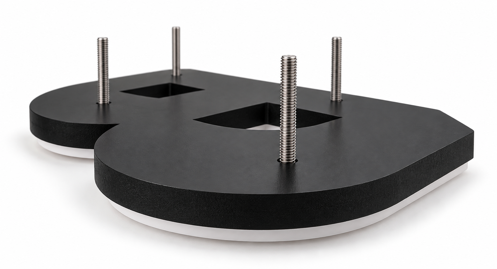 Matte black letters shown from behind with threaded metal pins installed into the back for pin-mount installation.