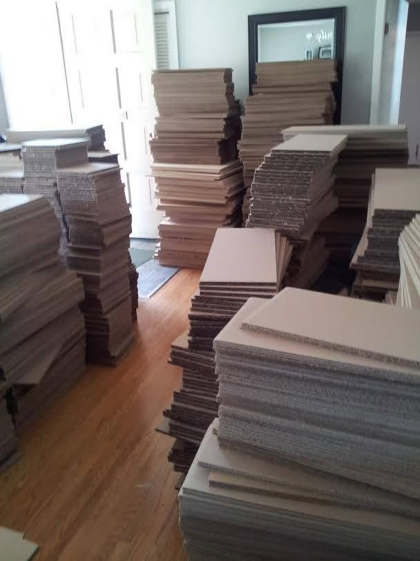 Stacks of sign material filling the rooms of our home as the hobby grew