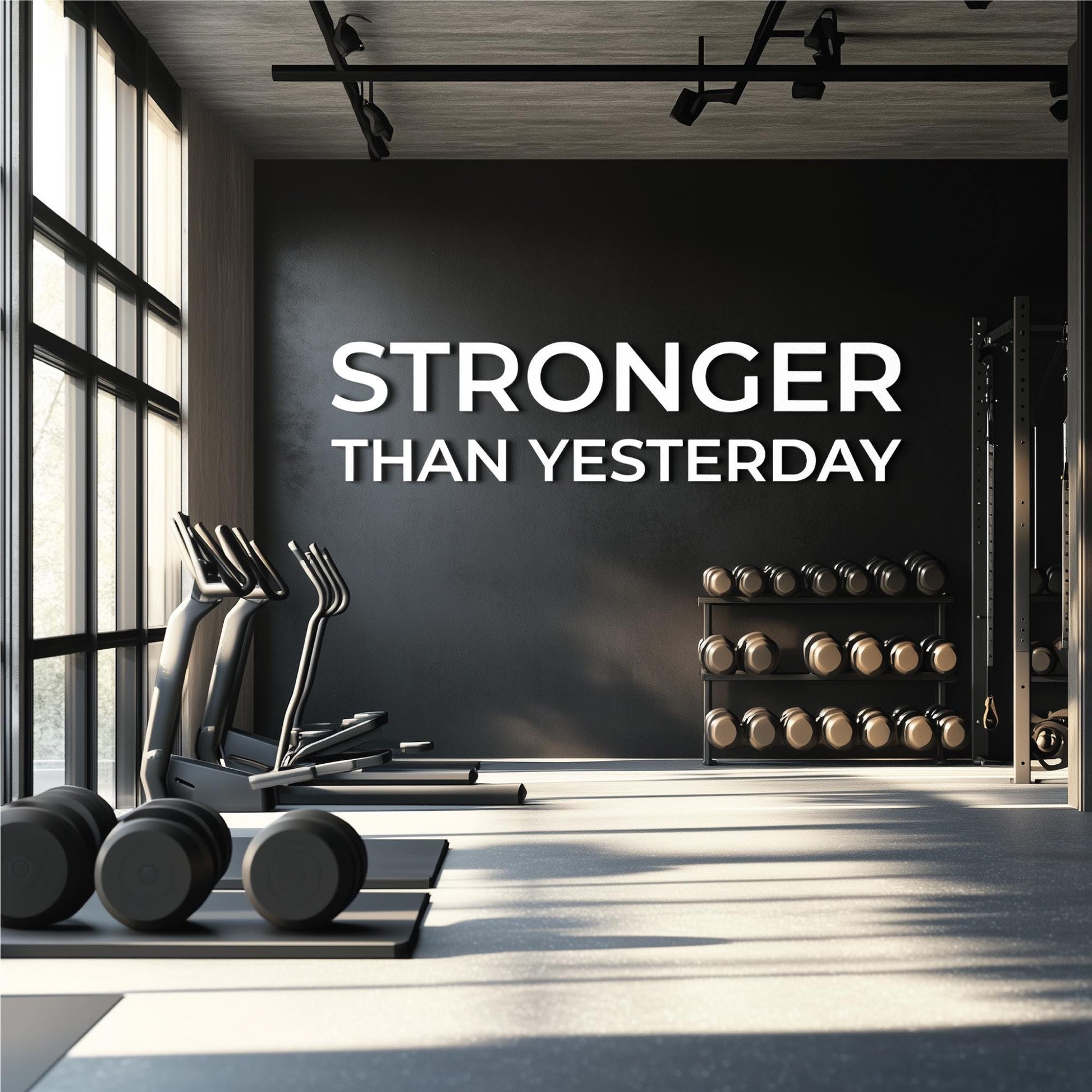 home gym wall decor stronger than yesterday quote 3D letters above dumbbell rack modern fitness room